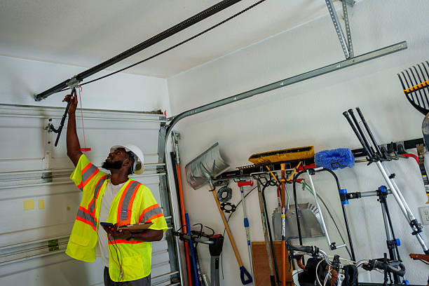 Professional Garage Door Panel Replacement technician working in Mayfield, PA